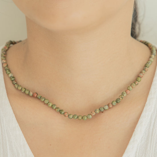 Gemstone & Gold Necklace handmade by Village Thrive using natural materials.