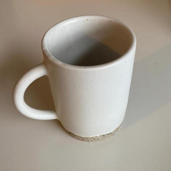 Wabi Ceramic Mug handmade by Village Thrive using natural materials.