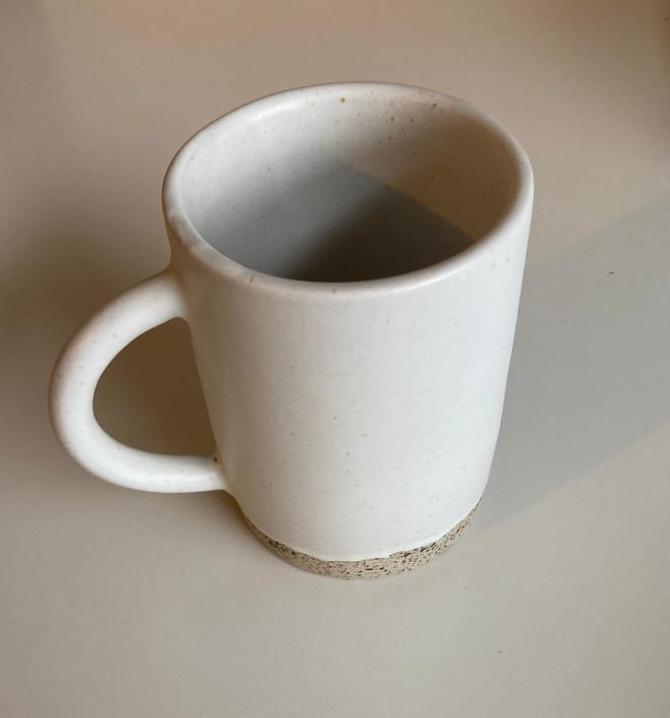 Wabi Ceramic Mug handmade by Village Thrive using natural materials.