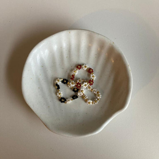 Wabi Ceramic Shell Catch All handmade by Village Thrive using natural materials.