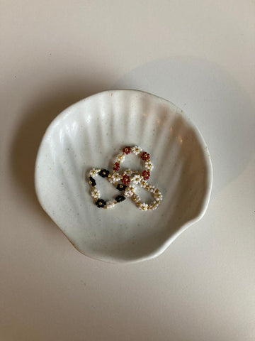 Wabi Ceramic Shell Catch All handmade by Village Thrive using natural materials.