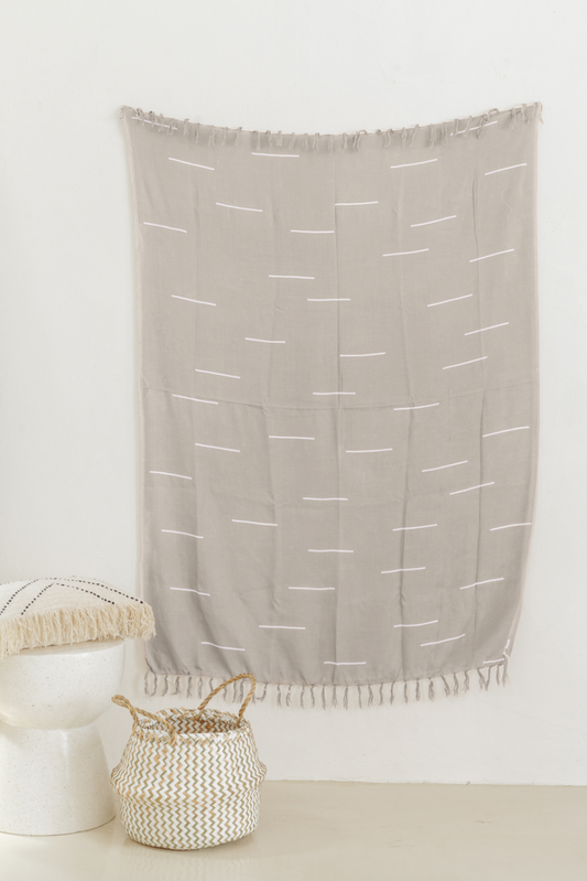 Lines Tapestry handmade by Village Thrive using natural materials.